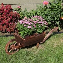 Sunnydaze Decor Sunnydaze Wooden Decorative Wheelbarrow Planter For Patio, Lawn And Garden - 35" L X 10" W X 11" - Brown 8 Sunnydaze Decor Sunnydaze Wooden Decorative Wheelbarrow Planter For Patio, Lawn And Garden - 35" L X 10" W X 11" - Brown -Sunnydaze Decor GUEST 184c9e78 69a1 486d 9b8a 096da196070c