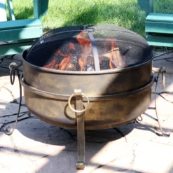 Sunnydaze Decor Sunnydaze Outdoor Camping Or Backyard Round Cauldron Fire Pit With Spark Screen, Log Poker, And Metal Wood Grate