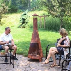 Sunnydaze Decor Sunnydaze Outdoor Backyard Large Freestanding Oxidized Steel Wood-Burning Fire Pit Chiminea - 70" - Rust Finish 18 Sunnydaze Decor Sunnydaze Outdoor Backyard Large Freestanding Oxidized Steel Wood-Burning Fire Pit Chiminea - 70" - Rust Finish -Sunnydaze Decor GUEST cc22fb48 0a91 4737 9296 cebd16dc6fe7