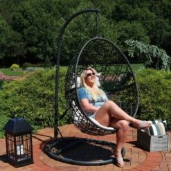 Sunnydaze Decor Sunnydaze Outdoor Resin Wicker Patio Caroline Lounge Hanging Basket Egg Chair Swing With Cushions And Steel Stand Set- 3pc -Sunnydaze Decor GUEST d557c6e4 dbf5 4eca a247 8d9c998f74e9